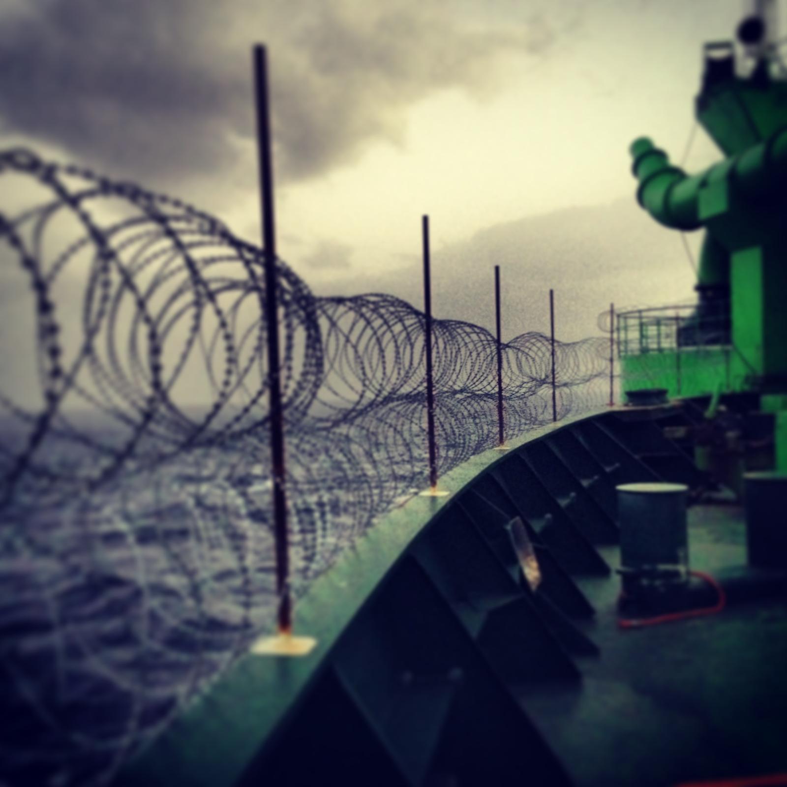 Deck safety barrier with stormy seas